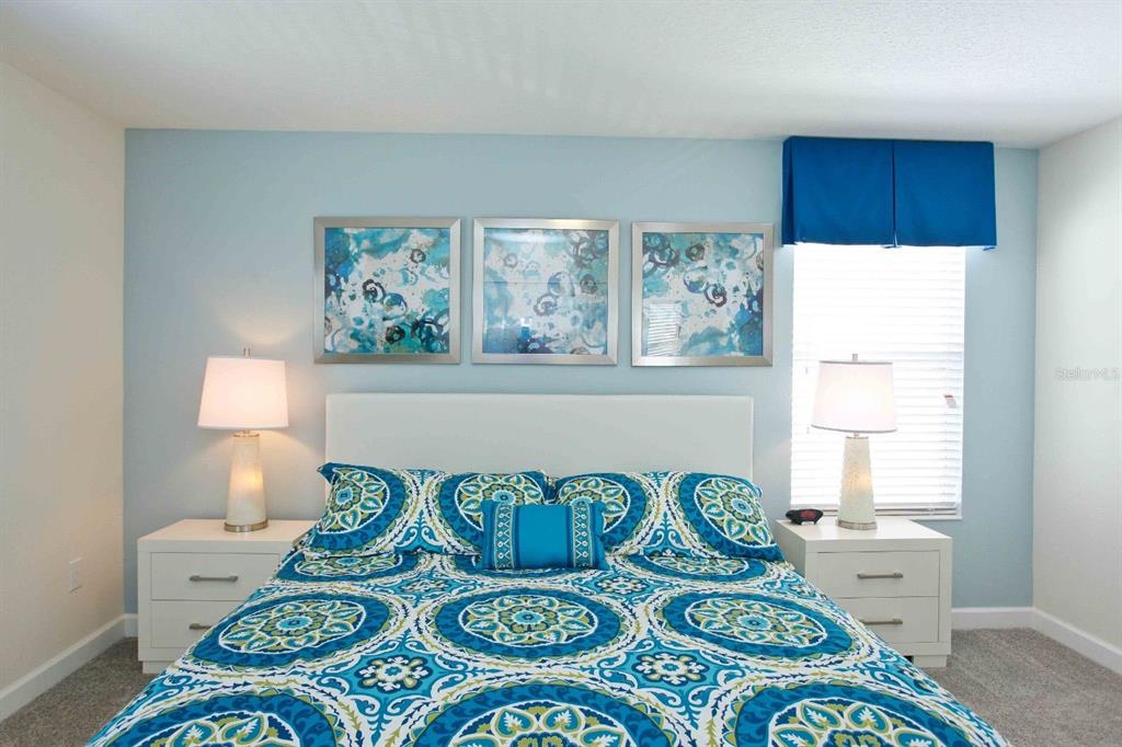 4839 Kings Castle Circle Kissimmee, FL 34746 - Photo 3 of 20 a view of a dining area with furniture and a window