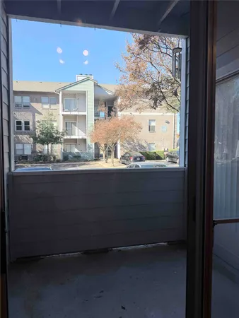 a room with a large window and sign