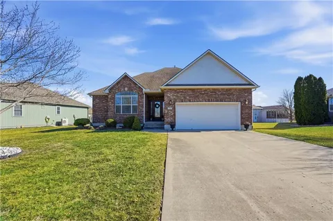 $370,000 | 709 Bluestem Court, Raymore, MO 64083