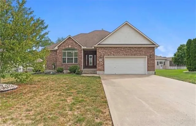 $370,000 | 709 Bluestem Court, Raymore, MO 64083