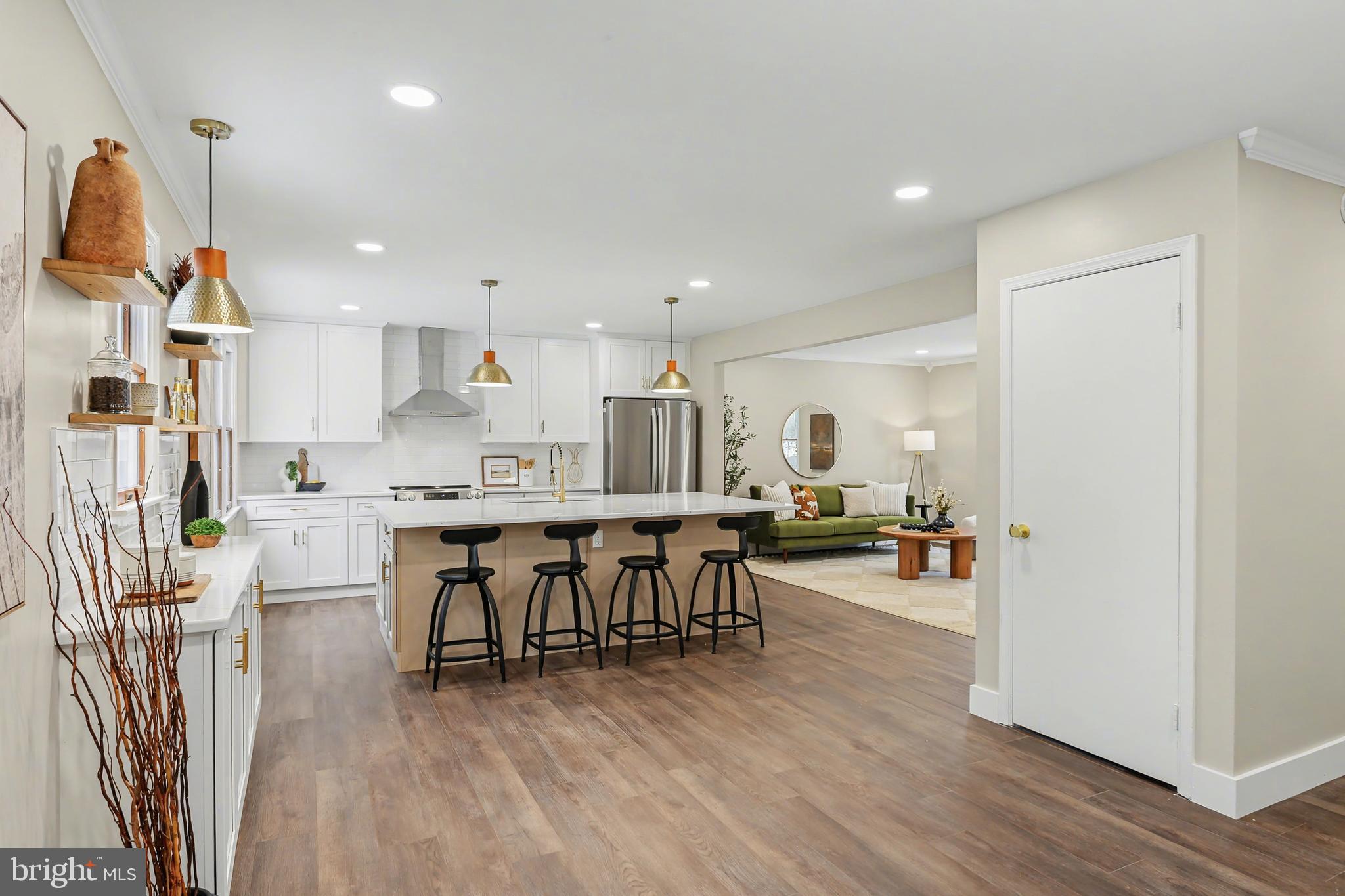 175 Timber Lane Lebanon, PA 17042 - Photo 16 of 39 a kitchen with stainless steel appliances a table chairs refrigerator and cabinets