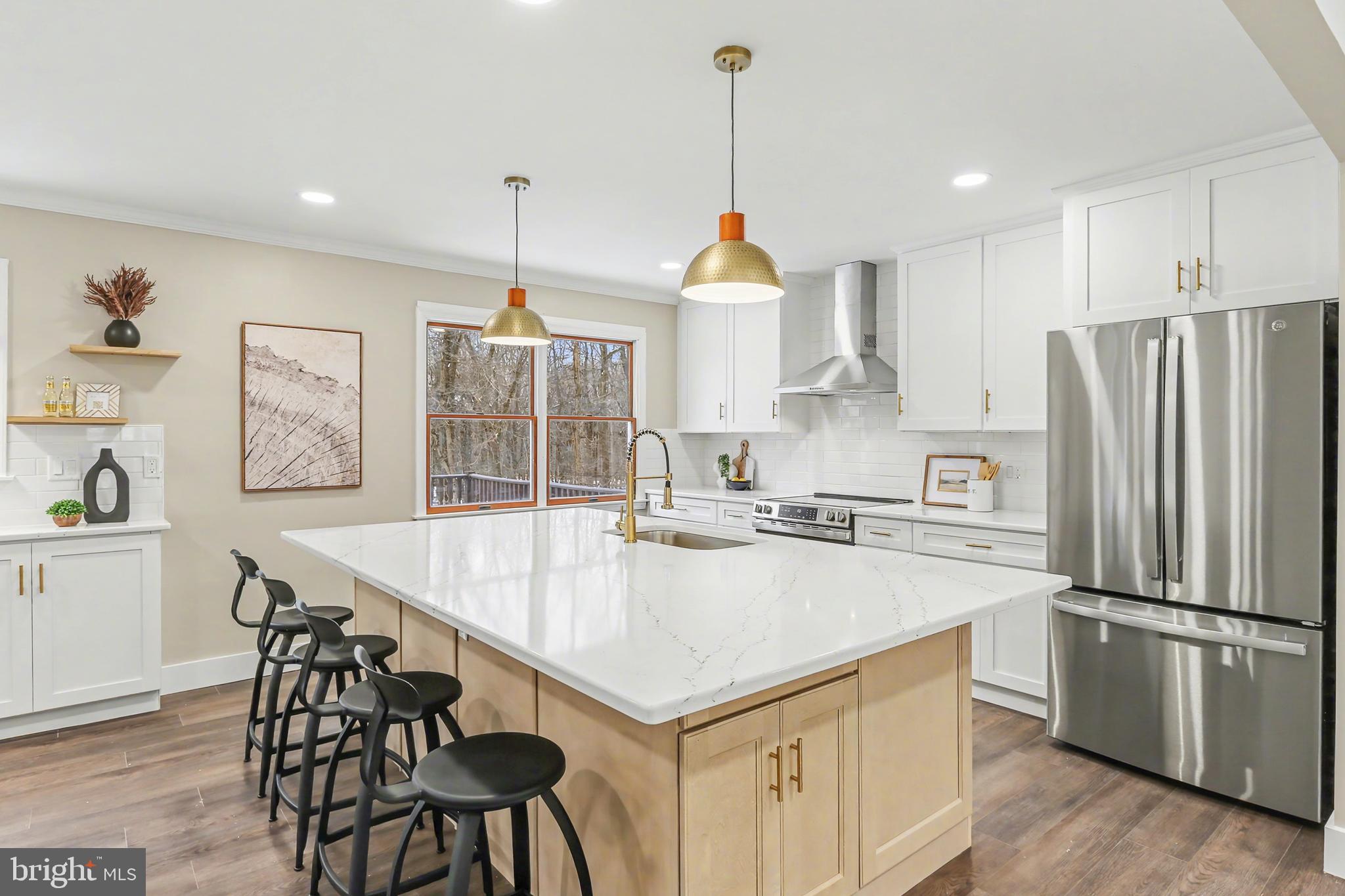 175 Timber Lane Lebanon, PA 17042 - Photo 8 of 39 a kitchen with stainless steel appliances granite countertop a sink a stove a refrigerator and island