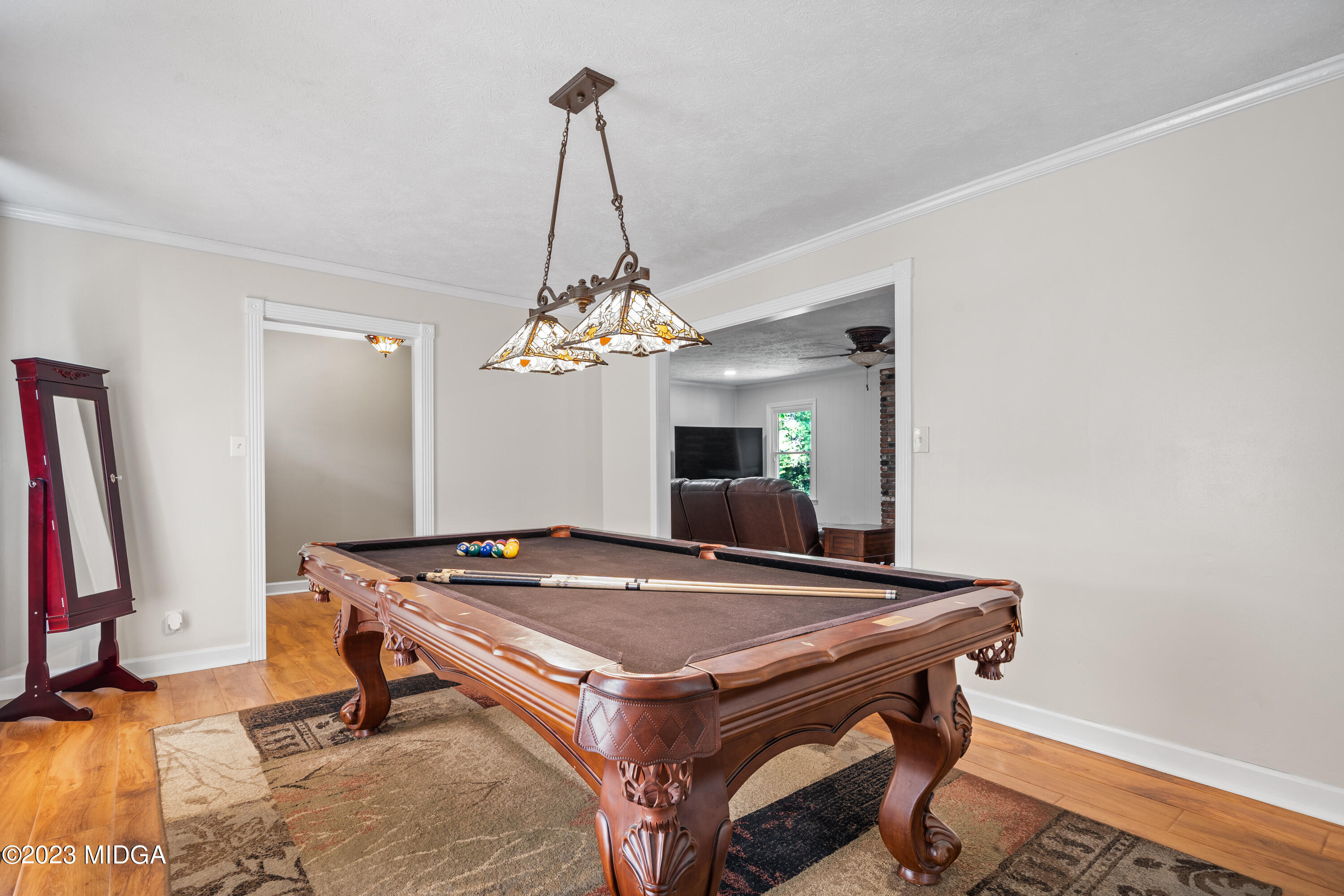 421 Plantation Road Gray, GA 31032 - Photo 12 of 31 a room with pool table and a chandelier