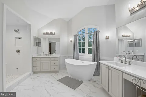 a bed room with a bed and a couch