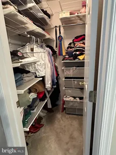 a room with gym equipment and a mirror