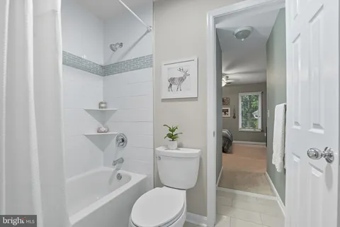 a kitchen with stainless steel appliances a refrigerator and a stove top oven