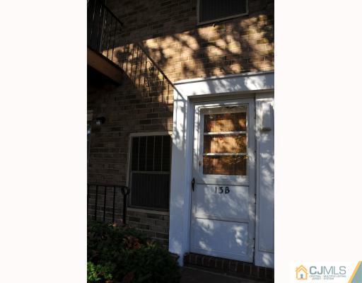 199 Evergreen Road, Unit 13B Edison, NJ 08837 - Photo 3 of 16 a picture of a bathroom with a door