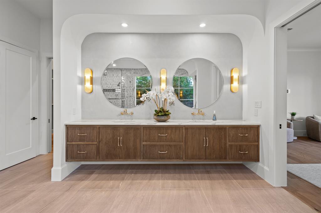 5925 Williamstown Road Dallas, TX 75230 - Photo 22 of 39 Full bathroom featuring double vanity, a stall shower, recessed lighting, and wood finish floors