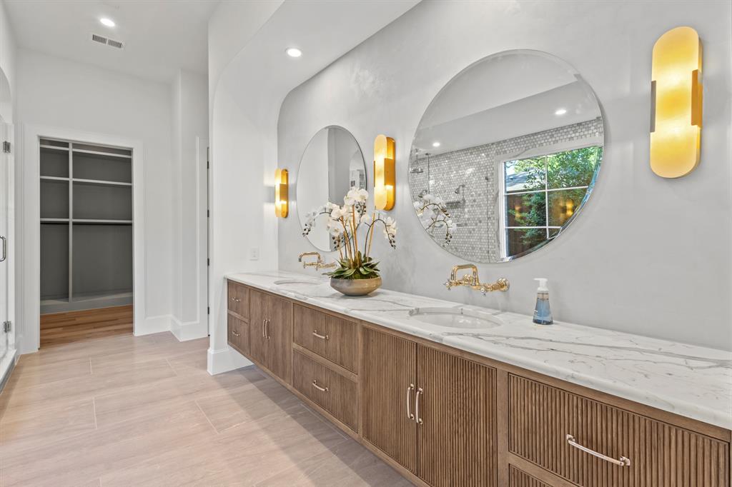 5925 Williamstown Road Dallas, TX 75230 - Photo 23 of 39 Full bath featuring a stall shower, double vanity, a walk in closet, recessed lighting, and wood finish floors