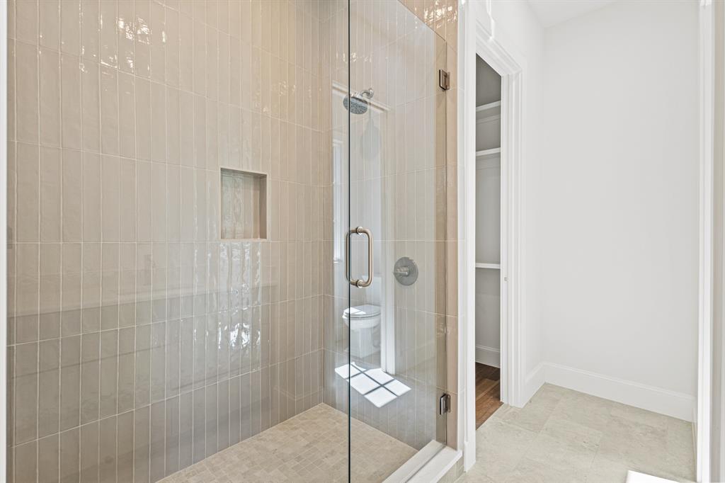 5925 Williamstown Road Dallas, TX 75230 - Photo 25 of 39 Bathroom featuring glass shower and tile floors.