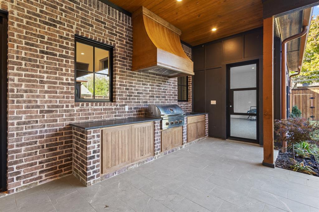 5925 Williamstown Road Dallas, TX 75230 - Photo 26 of 29 View of patio / terrace with an outdoor kitchen
