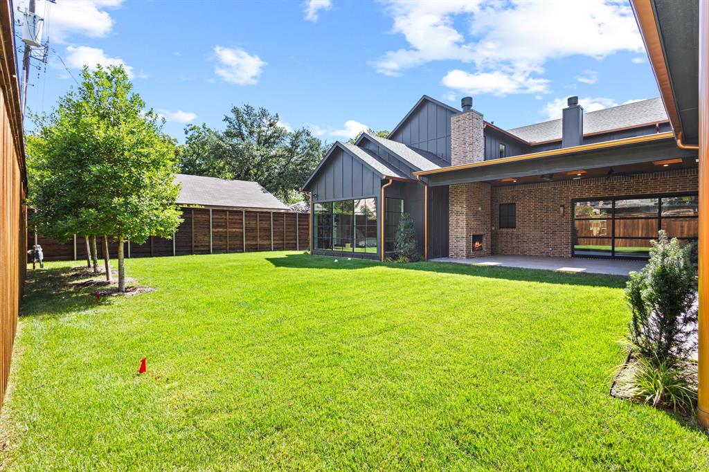 5925 Williamstown Road Dallas, TX 75230 - Photo 37 of 39 Fenced backyard featuring a patio area