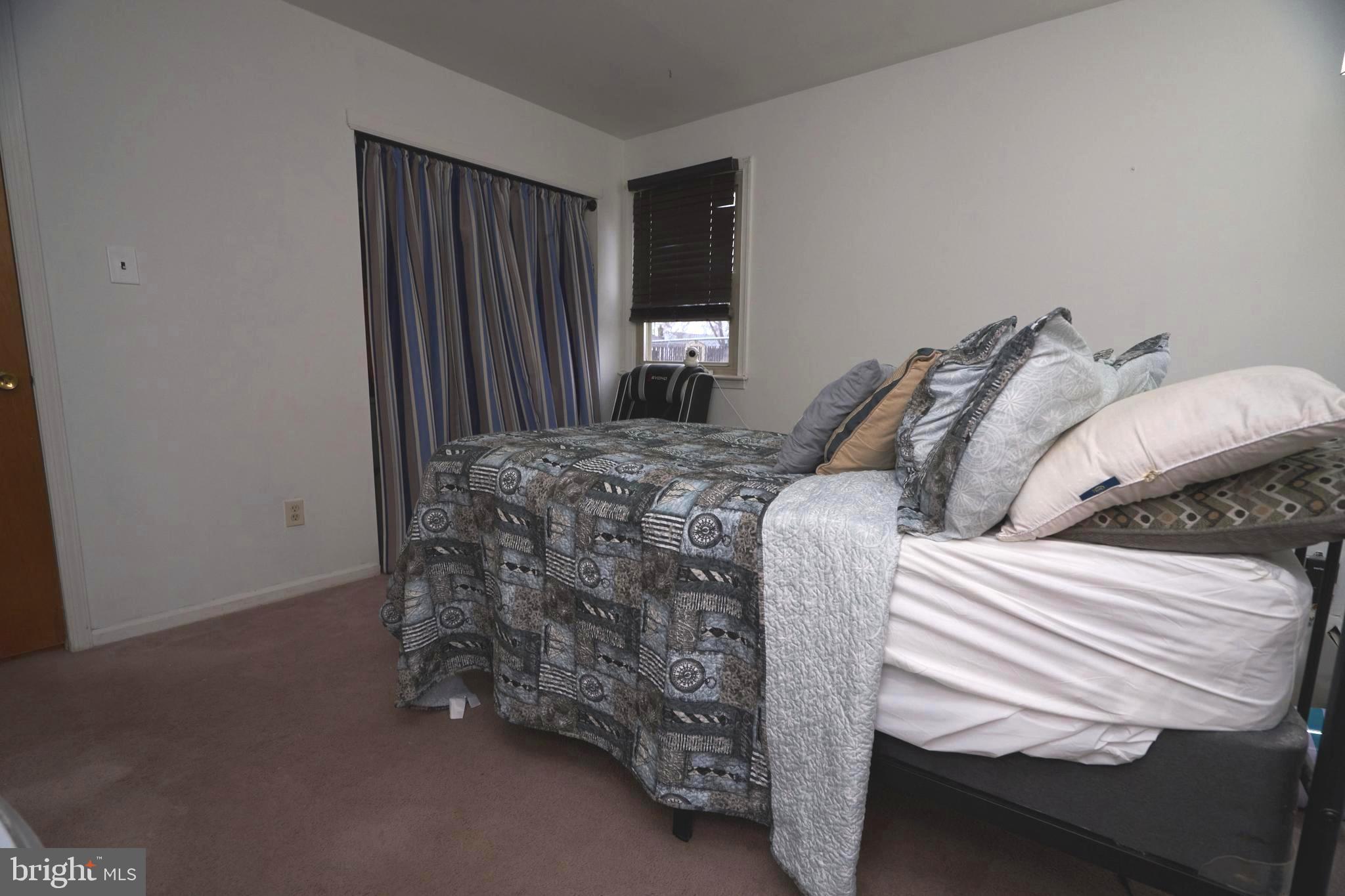 2113 Pennsylvania Avenue Croydon, PA 19021 - Photo 16 of 36 a bedroom with furniture and a window