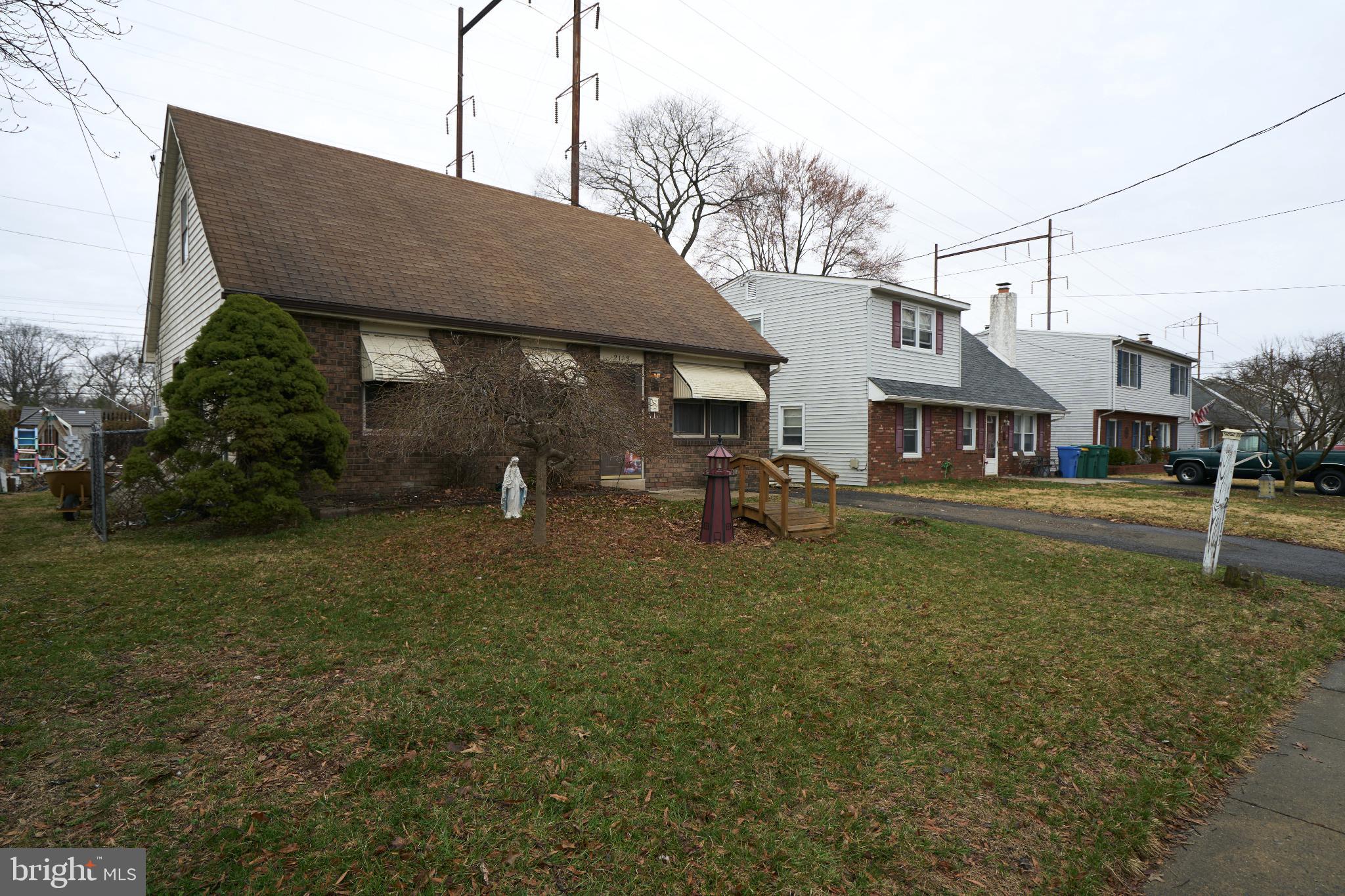 2113 Pennsylvania Avenue Croydon, PA 19021 - Photo 27 of 36 a backyard of a house with barbeque oven table and chairs