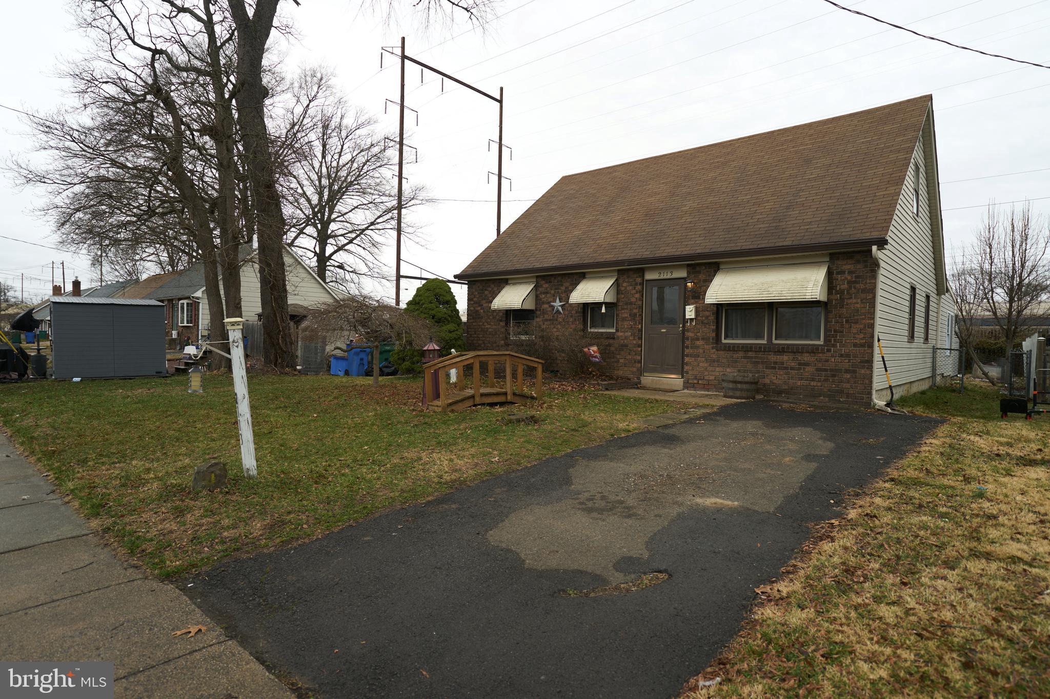 2113 Pennsylvania Avenue Croydon, PA 19021 - Photo 36 of 36 a front view of a house with garden