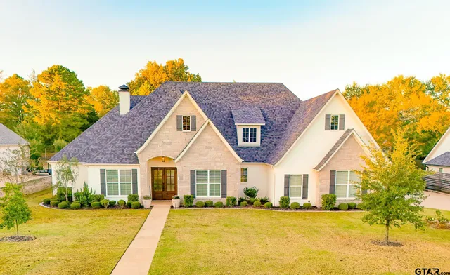 a view of a house with a swimming pool