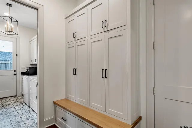 a view of a hallway with closet