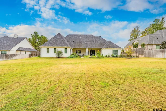 a view of a house with a swimming pool