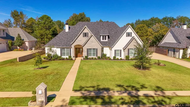 a view of a house with swimming pool