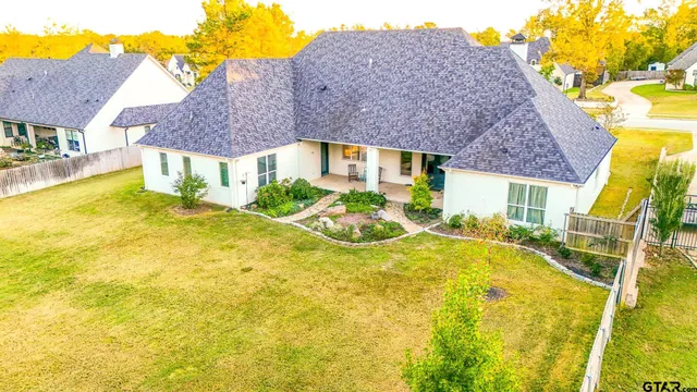 a view of a house with a swimming pool