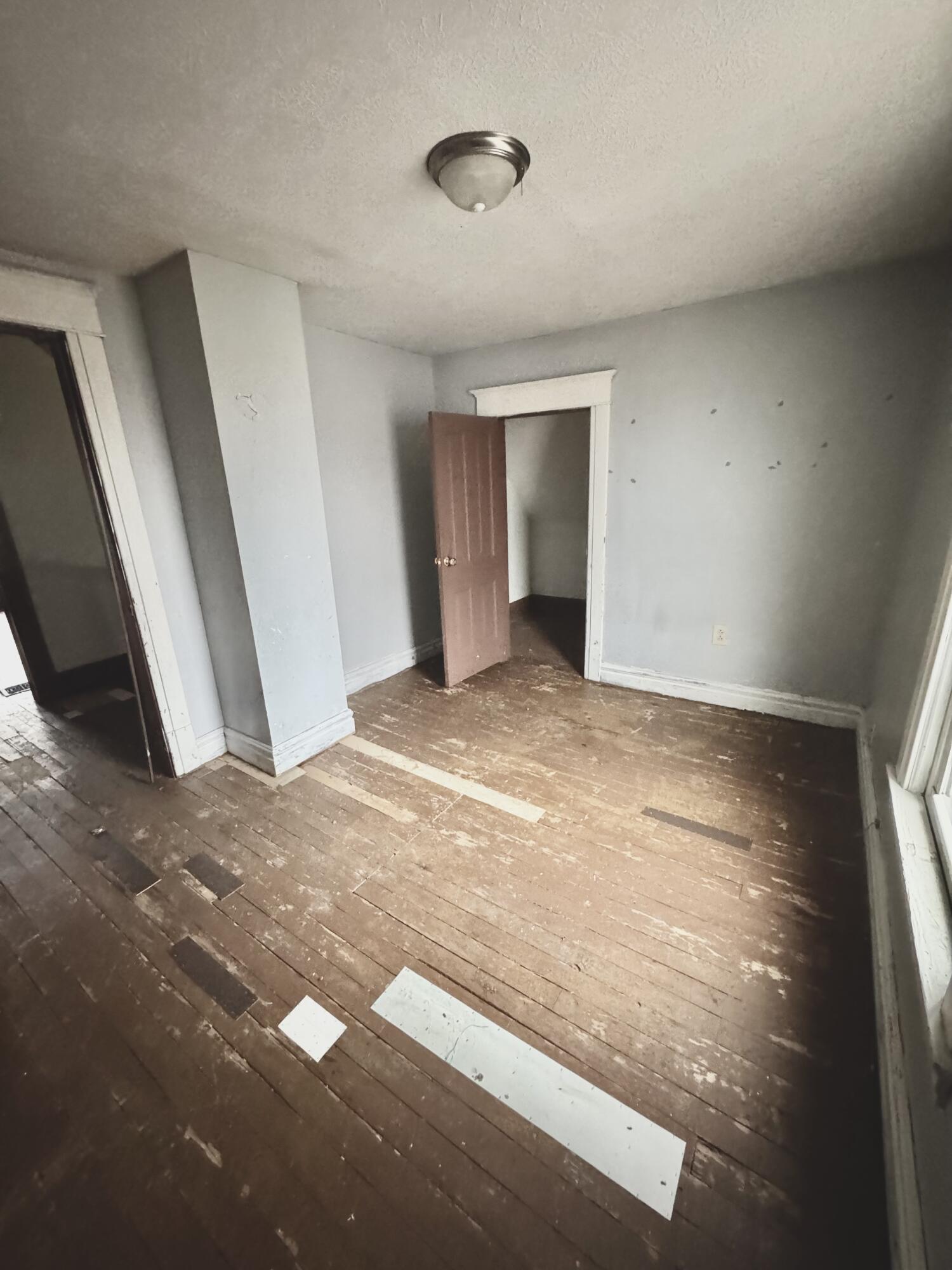 809 Chicago Street La Porte, IN 46350 - Photo 10 of 11 a view of an empty room and a window