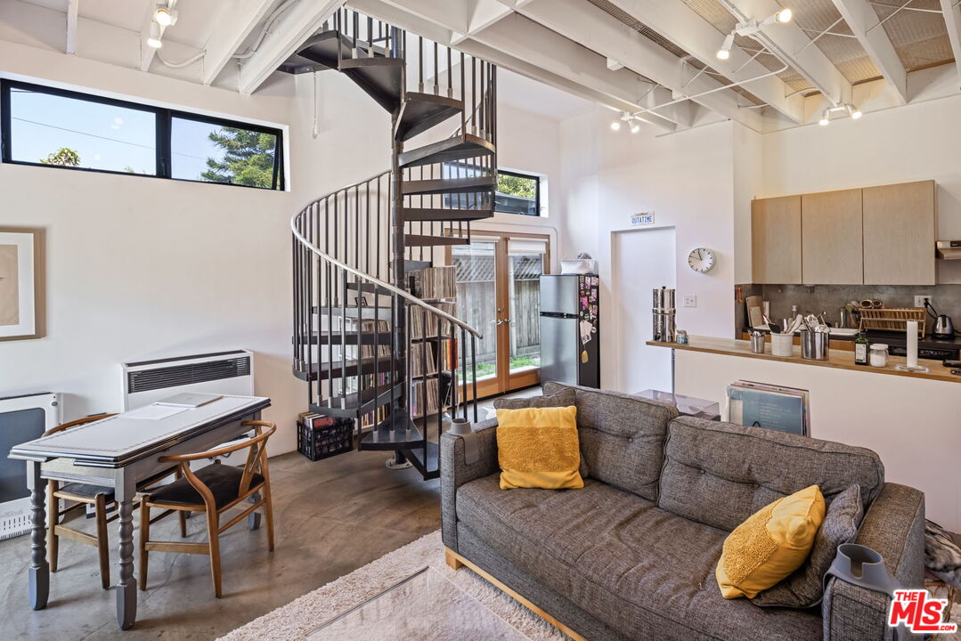 341 5th Avenue Venice, CA 90291 - Photo 22 of 24 a living room with furniture and wooden floor