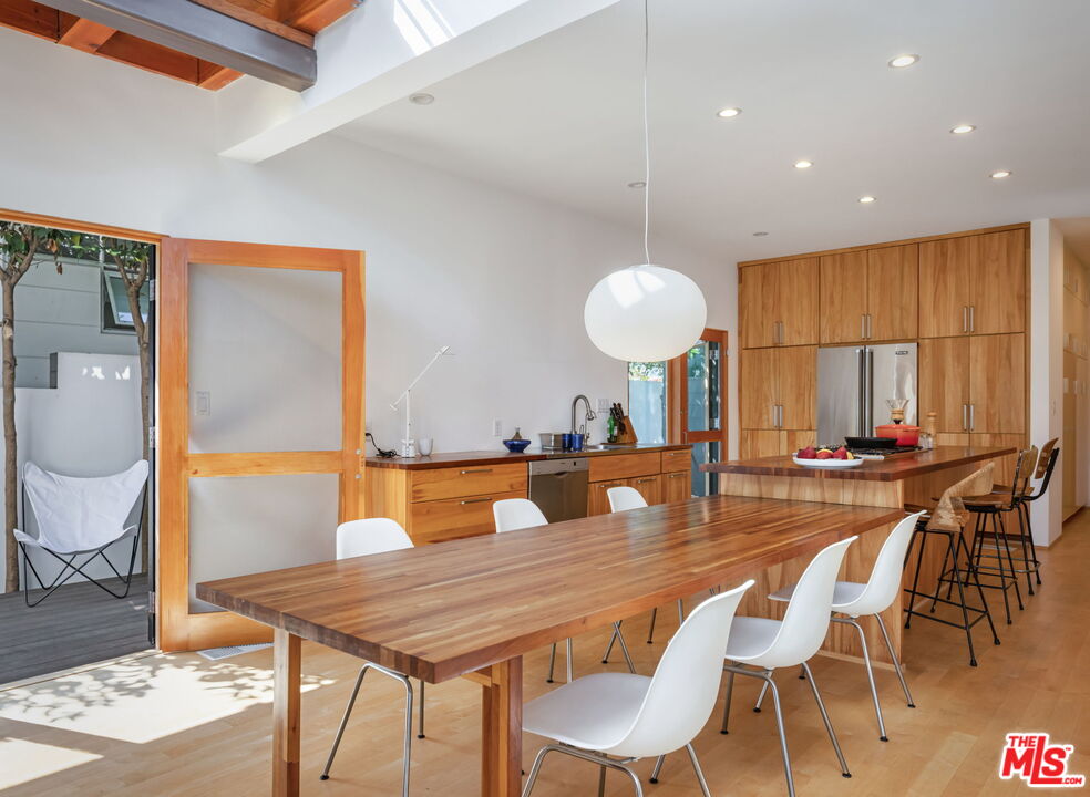 341 5th Avenue Venice, CA 90291 - Photo 8 of 24 a view of a dining room with furniture and wooden floor