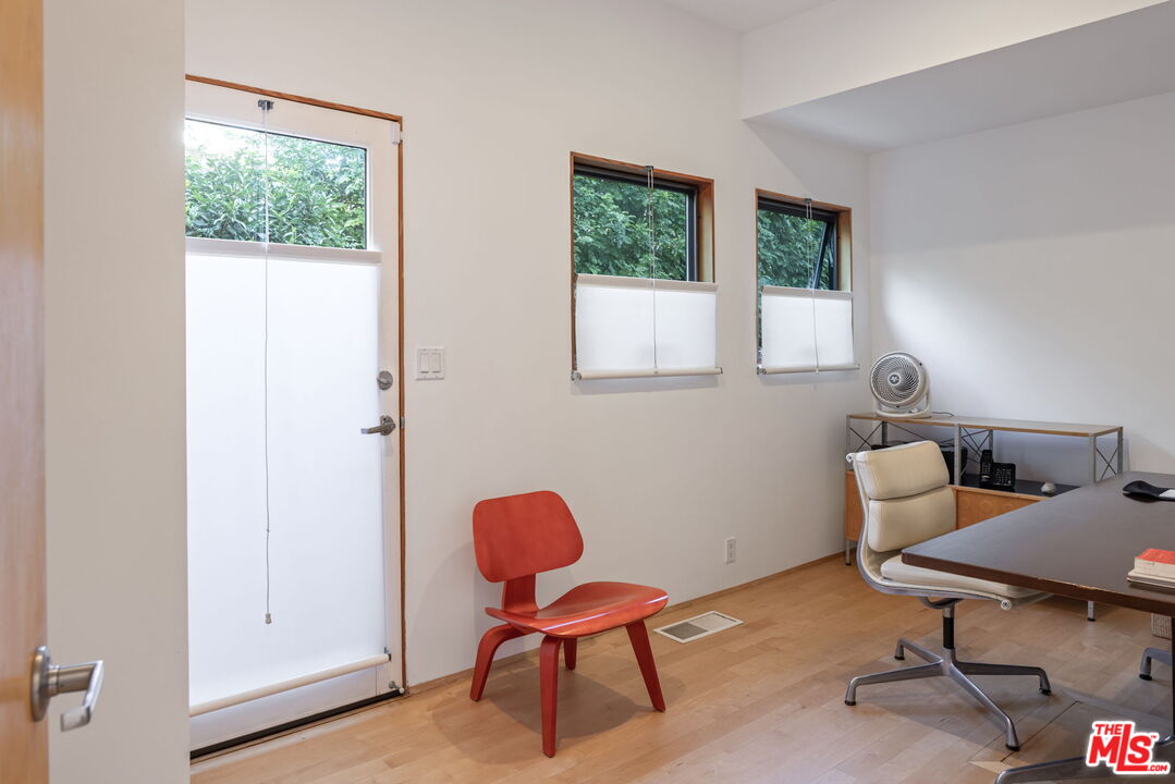 341 5th Avenue Venice, CA 90291 - Photo 10 of 24 a view of a workspace with furniture and a window
