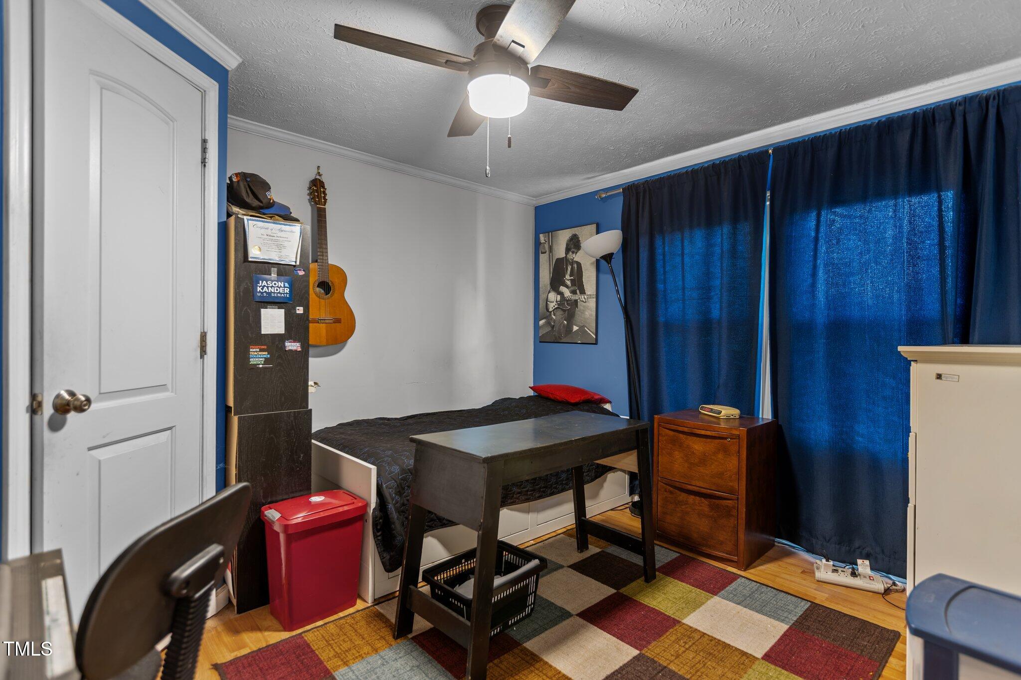 1167 John D Winstead Road Roxboro, NC 27574 - Photo 28 of 55 a view of a room with furniture and wooden floor