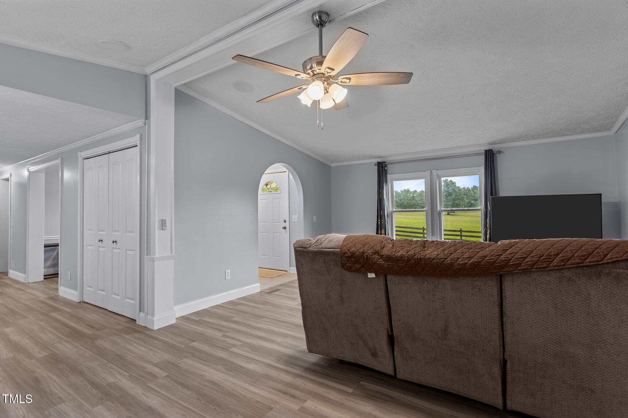 1167 John D Winstead Road Roxboro, NC 27574 - Photo 8 of 55 a living room with furniture and a large window