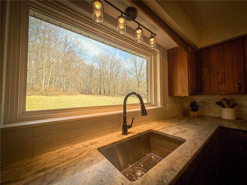 163 Crisswell Road Butler, PA 16002 - Photo 13 of 46 a kitchen with a sink and a window