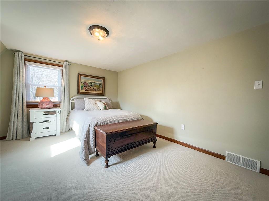 163 Crisswell Road Butler, PA 16002 - Photo 29 of 46 a bedroom with a bed and a cabinets