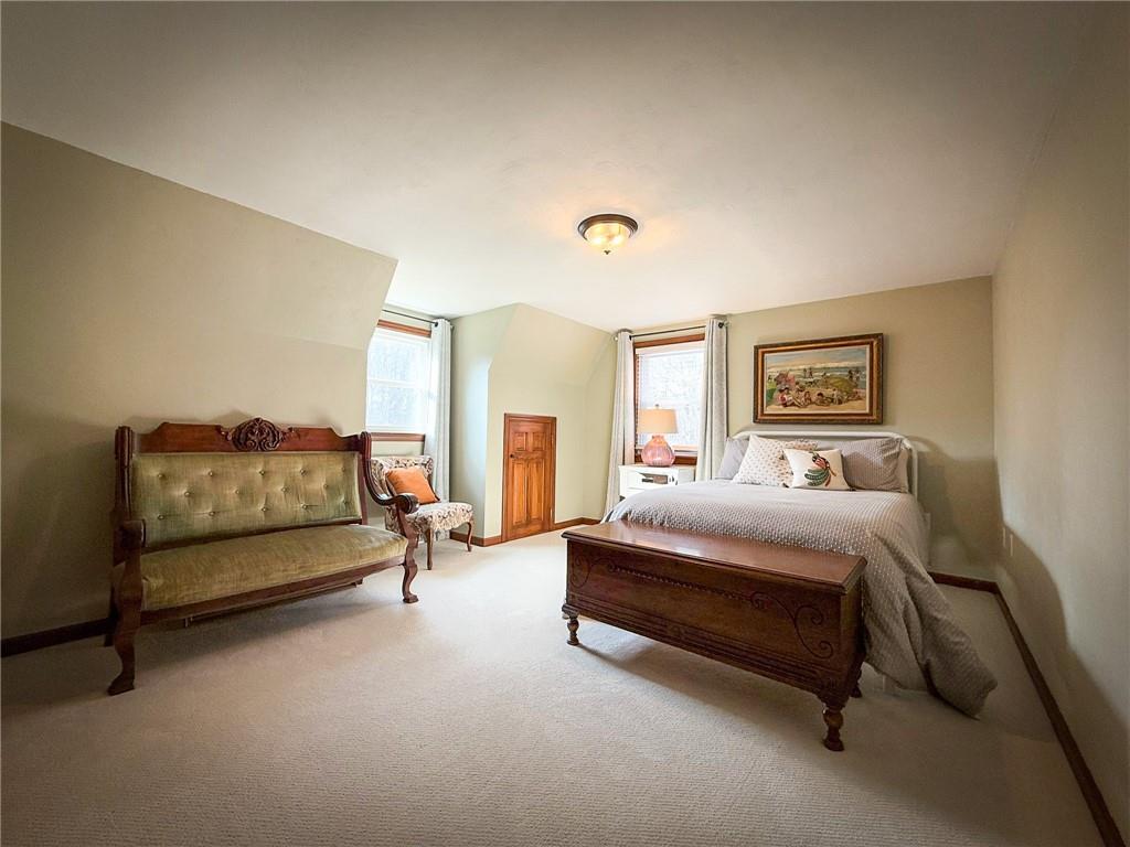 163 Crisswell Road Butler, PA 16002 - Photo 30 of 46 a bedroom with a bed and lamp