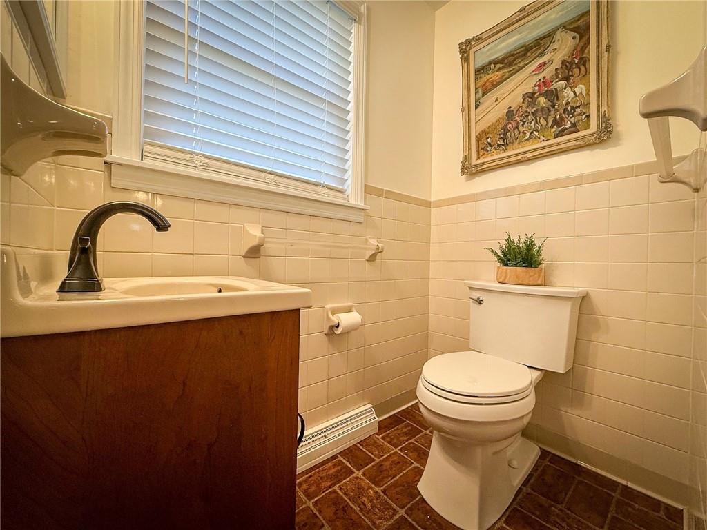 163 Crisswell Road Butler, PA 16002 - Photo 31 of 46 a bathroom with a sink and a toilet