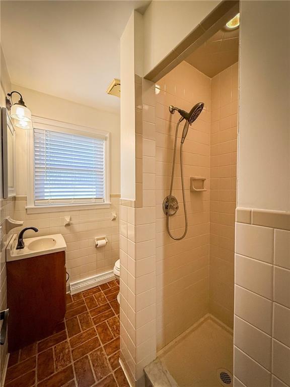 163 Crisswell Road Butler, PA 16002 - Photo 32 of 46 a bathroom with a granite countertop sink a toilet and shower