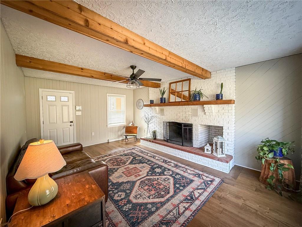 163 Crisswell Road Butler, PA 16002 - Photo 5 of 46 a living room with furniture and a fireplace