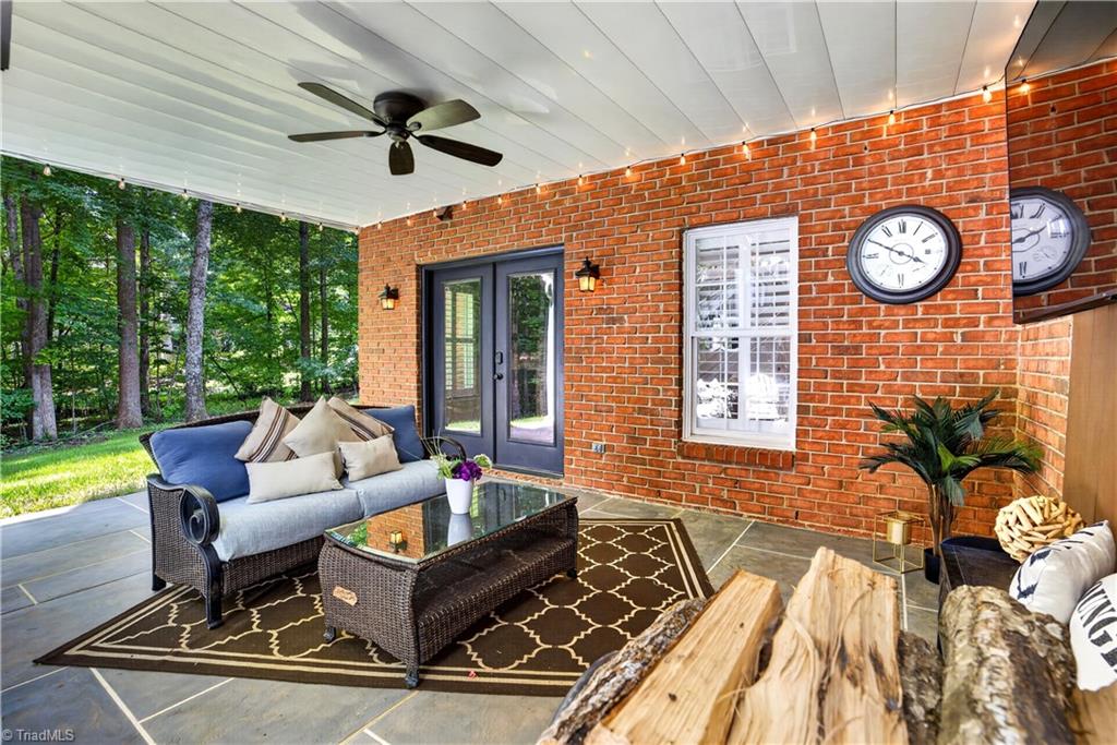 8508 Rosedale Drive Oak Ridge, NC 27310 - Photo 39 of 50 Shaded, open-air, and made for lingering.