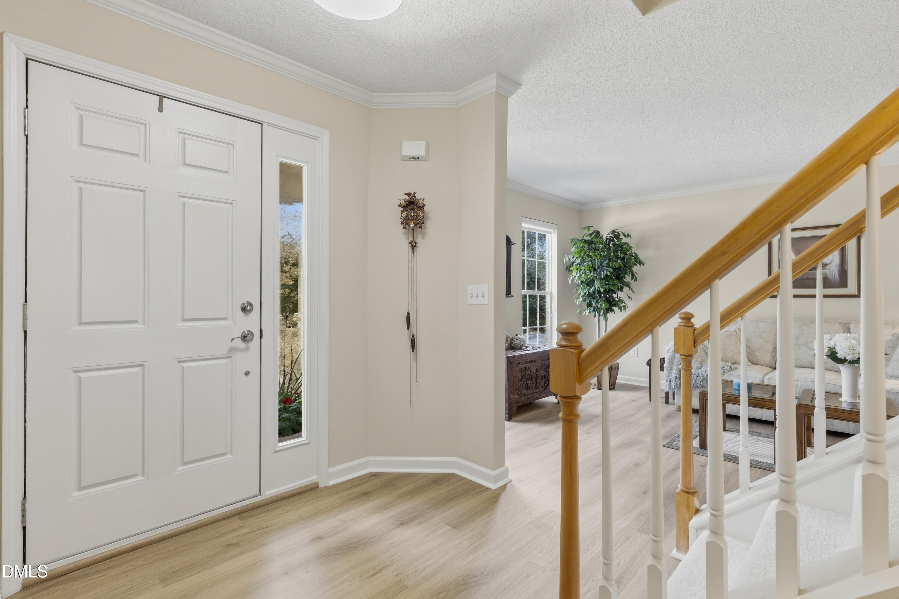1211 Waterford Green Drive Apex, NC 27502 - Photo 7 of 53 a view of an entryway with wooden floor