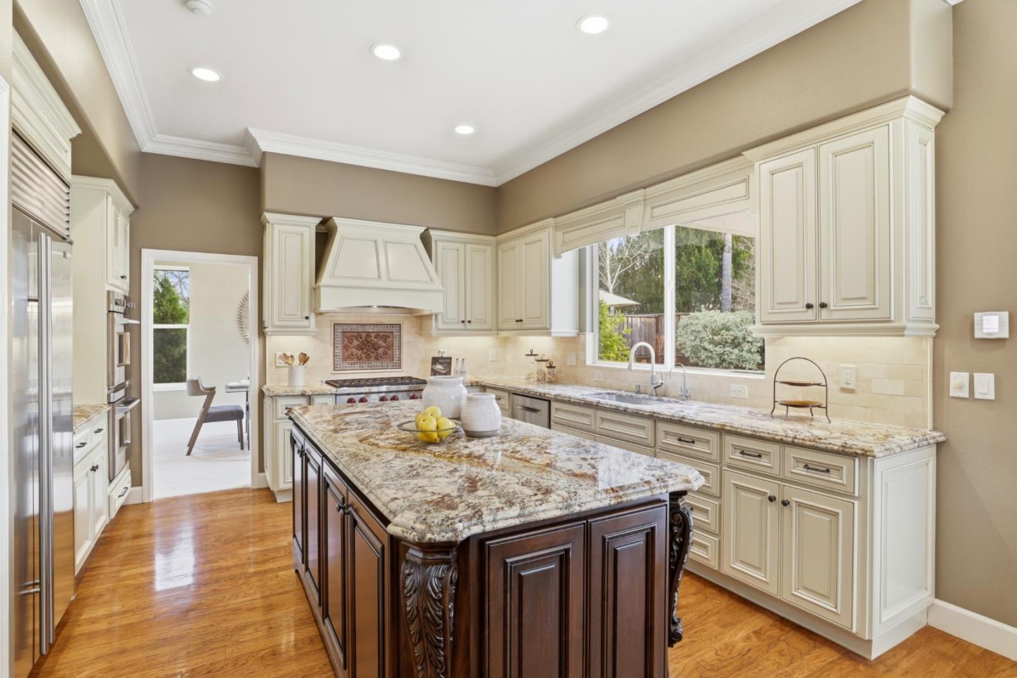 1134 Falcon Ridge Court San Jose, CA 95120 - Photo 13 of 63 a kitchen with granite countertop lots of counter top space and stainless steel appliances