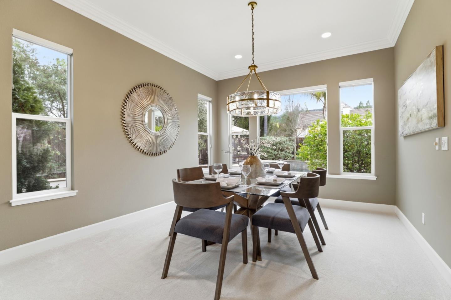 1134 Falcon Ridge Court San Jose, CA 95120 - Photo 17 of 63 a dining room with furniture a chandelier and a rug
