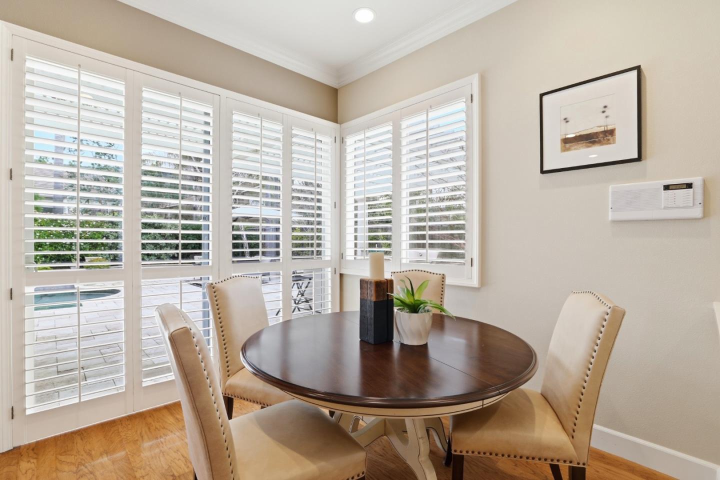 1134 Falcon Ridge Court San Jose, CA 95120 - Photo 19 of 63 a view of a dining room with furniture and wooden floor