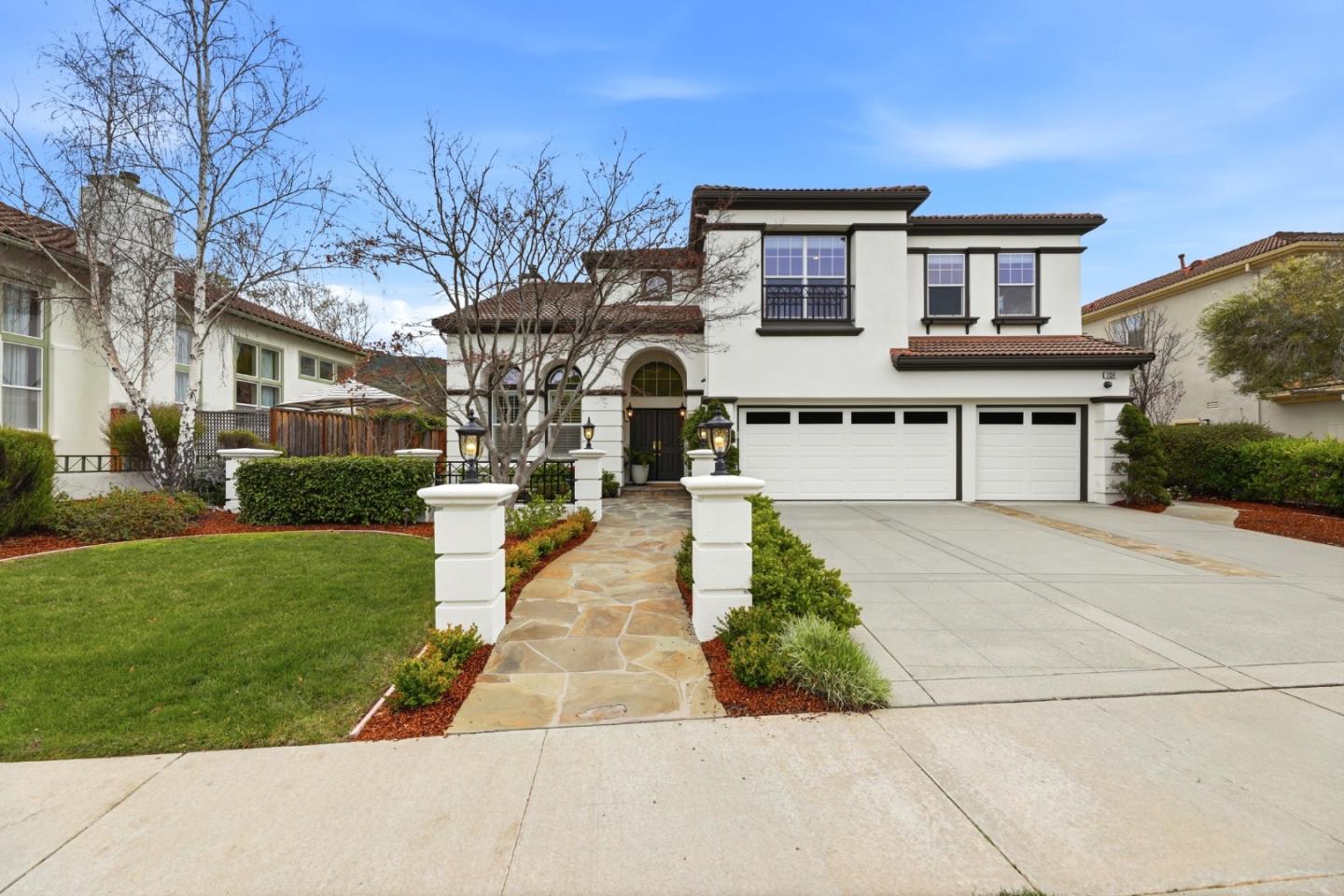 1134 Falcon Ridge Court San Jose, CA 95120 - Photo 2 of 63 a front view of a house with a yard