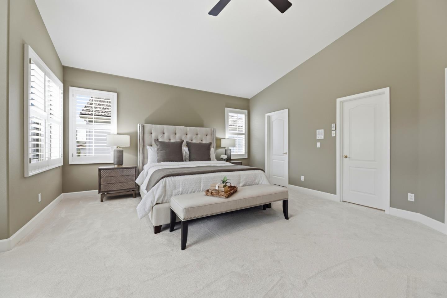 1134 Falcon Ridge Court San Jose, CA 95120 - Photo 28 of 63 a bedroom with a bed and a night stand