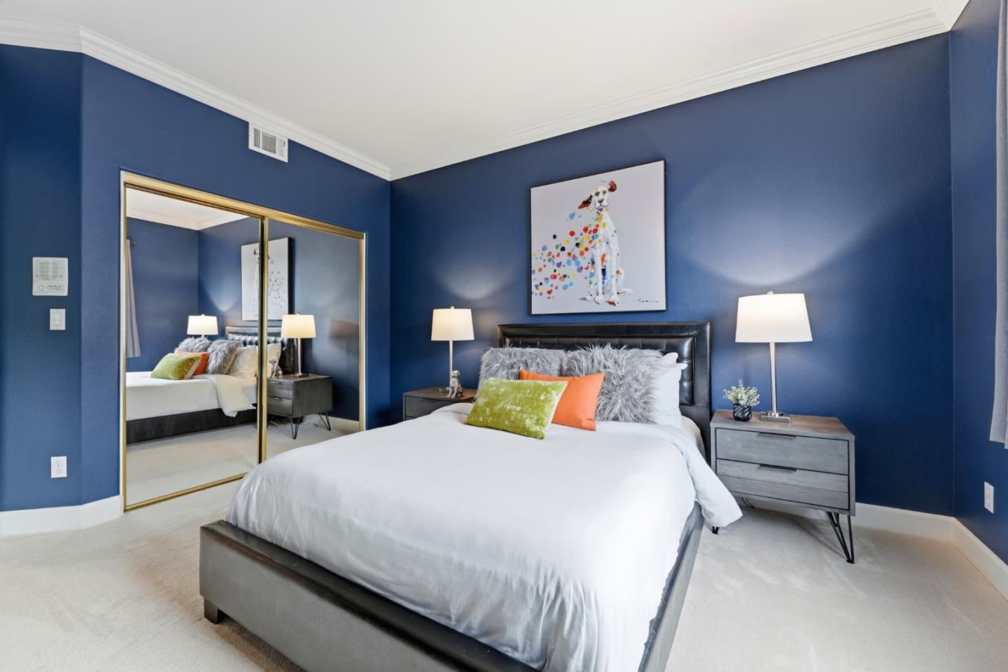 1134 Falcon Ridge Court San Jose, CA 95120 - Photo 30 of 63 a bedroom with a bed and lamp