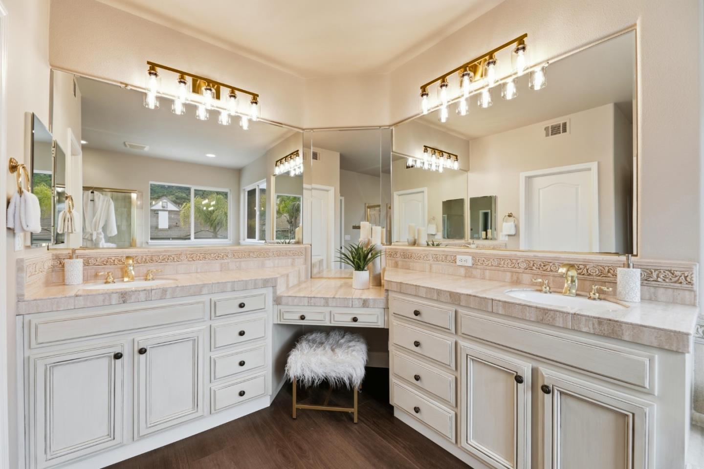 1134 Falcon Ridge Court San Jose, CA 95120 - Photo 37 of 63 a spacious bathroom with a granite countertop sink mirror and cabinets