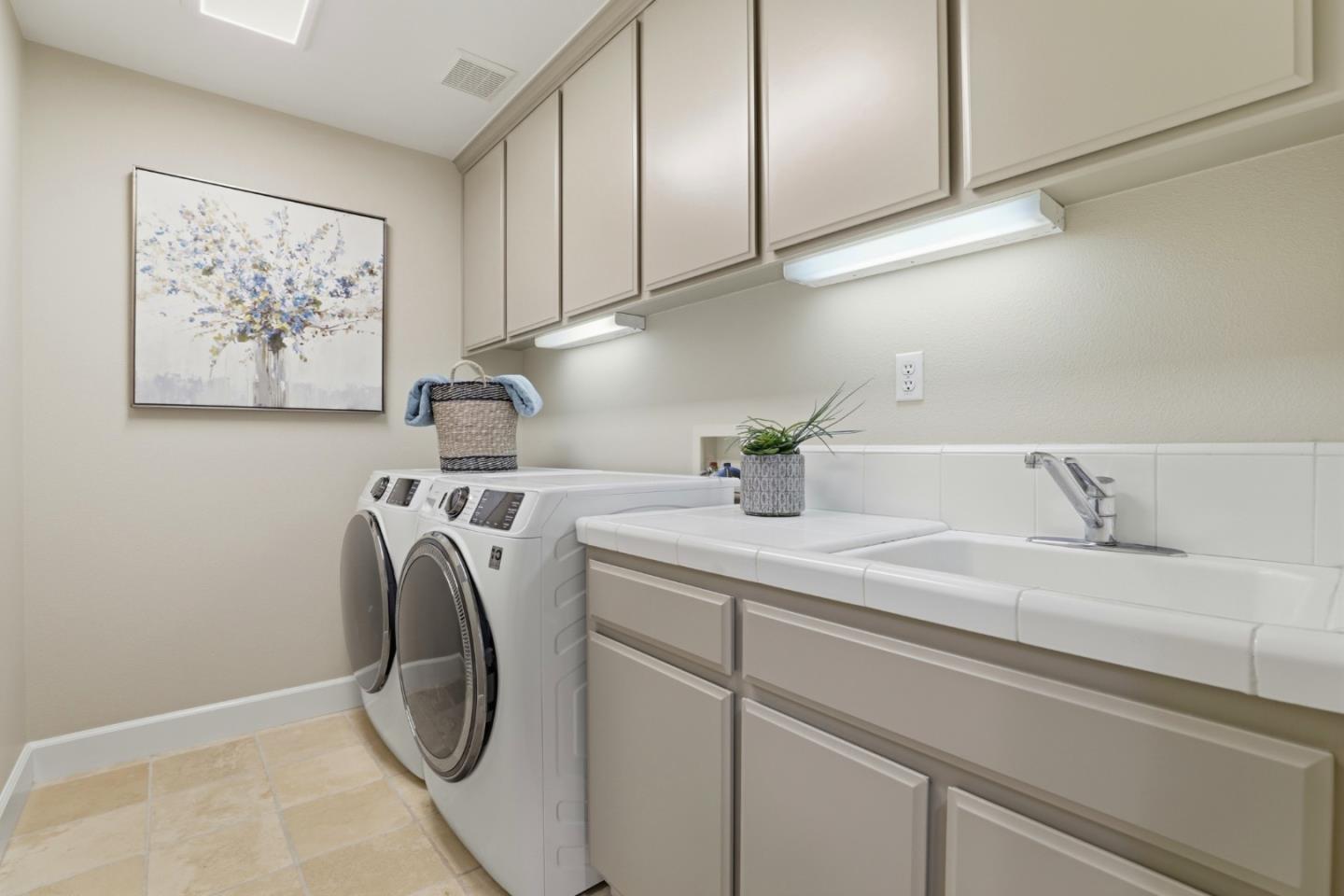 1134 Falcon Ridge Court San Jose, CA 95120 - Photo 42 of 63 a utility room with cabinets