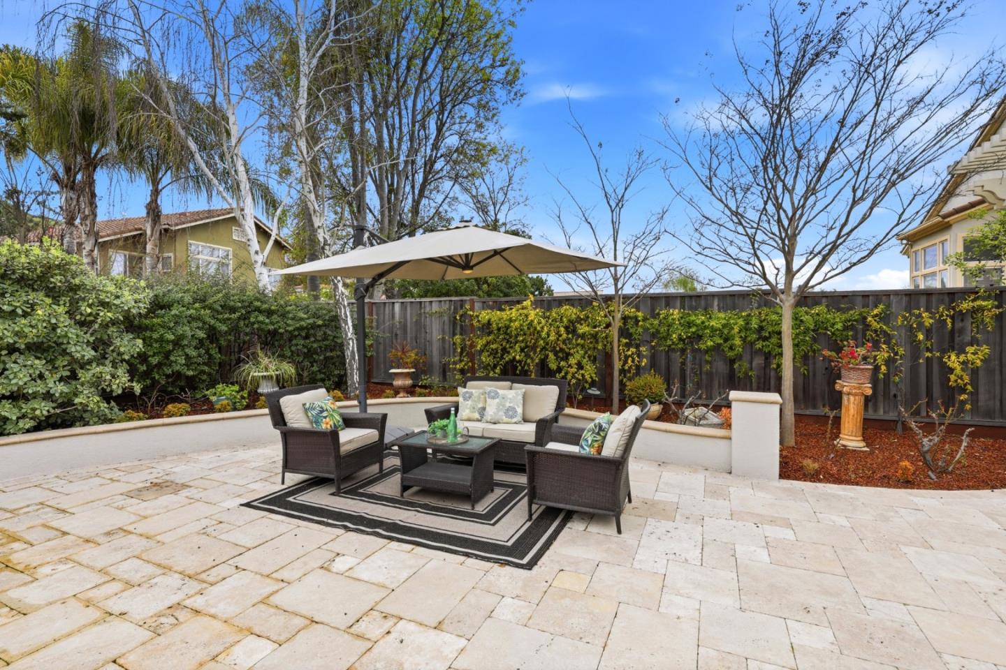 1134 Falcon Ridge Court San Jose, CA 95120 - Photo 46 of 63 a view of backyard with outdoor seating and trees
