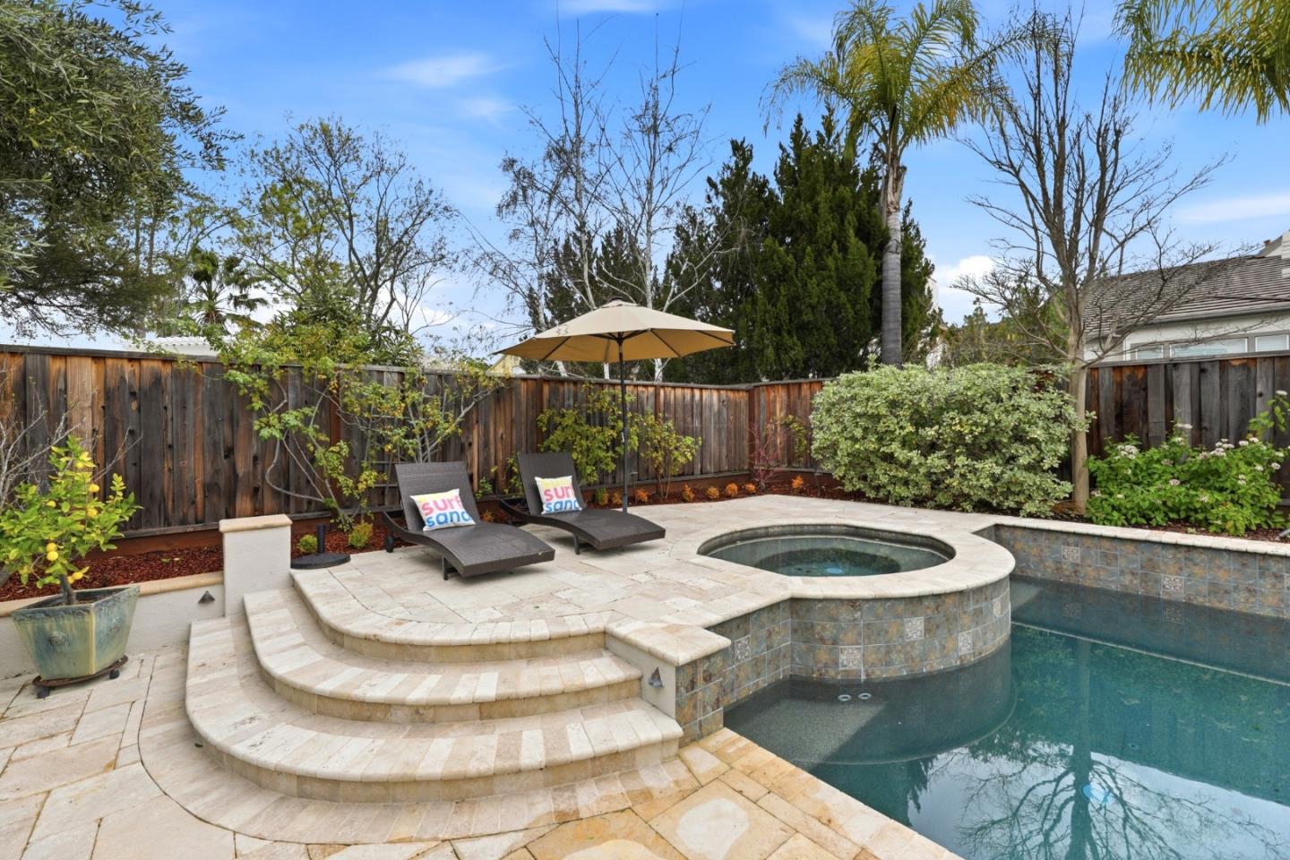 1134 Falcon Ridge Court San Jose, CA 95120 - Photo 52 of 63 a view of a chair and table in backyard