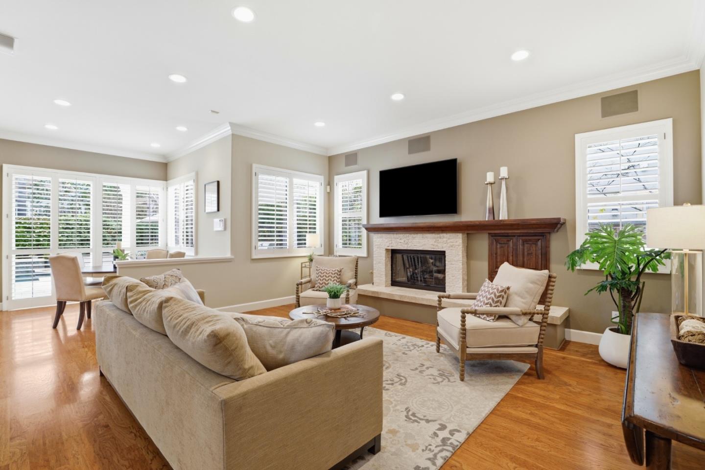 1134 Falcon Ridge Court San Jose, CA 95120 - Photo 10 of 63 a living room with furniture fireplace and a flat screen tv