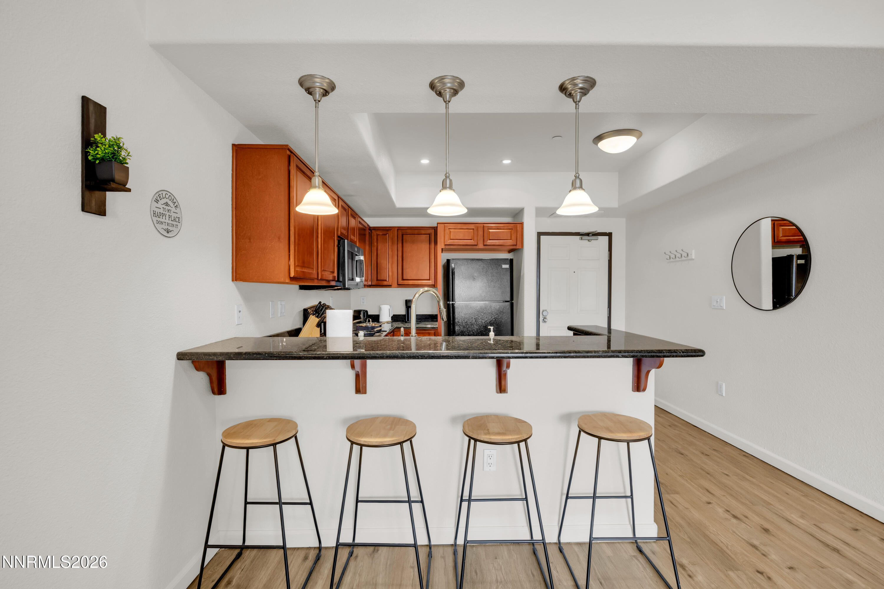 200 West 2nd Street, Unit 1506 Reno, NV 89501 - Photo 6 of 26 kitchen- breakfast bar